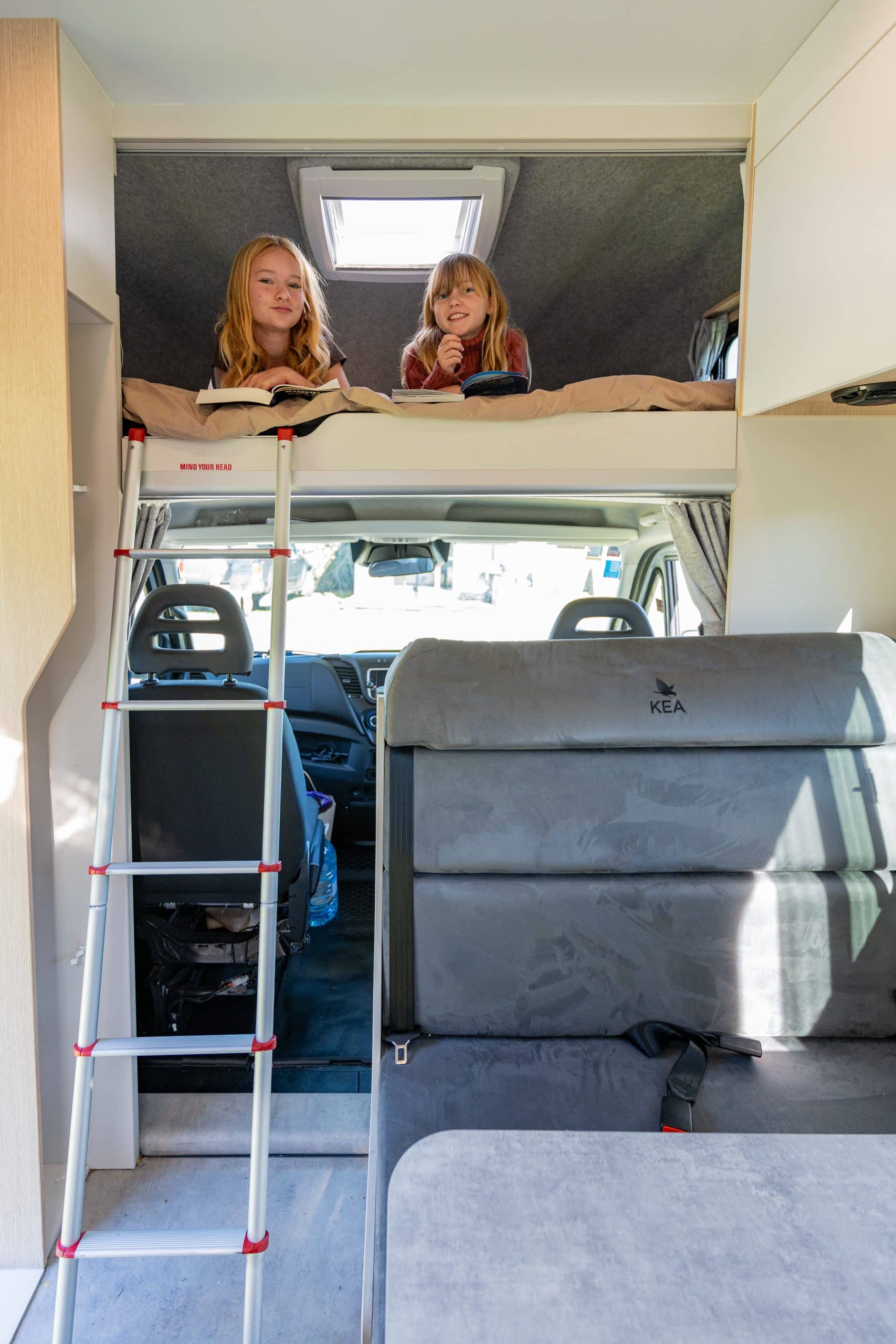 Kinderen in stapelbed camper Nieuw-Zeeland